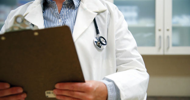 Medical person with clipboard