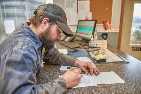 Mechanic doing paperwork