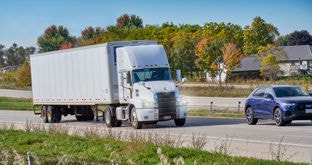 Semi Truck and trailer on Freeway